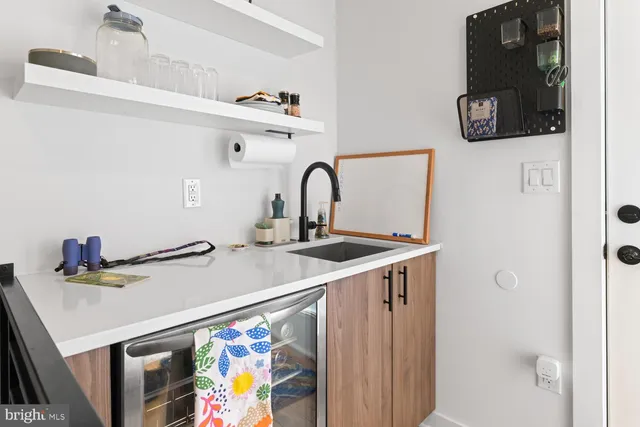 a view of a chair and table in the balcony