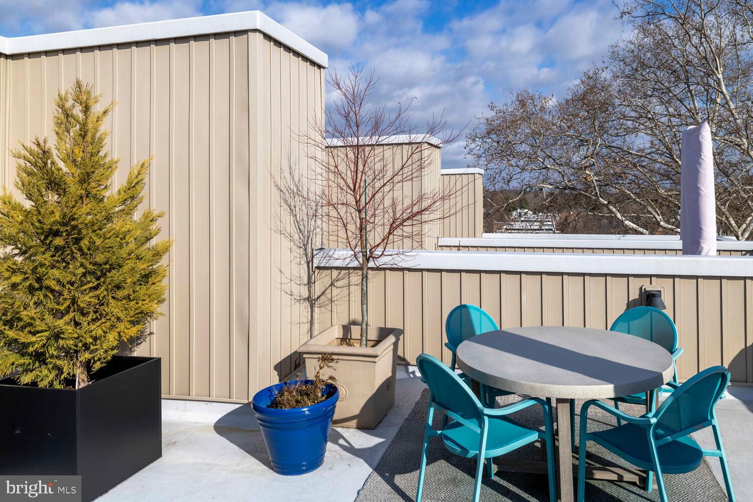 23 East Durham Street, Unit C2 Philadelphia, PA 19119 - Photo 27 of 40 a view of a chair and table in the balcony