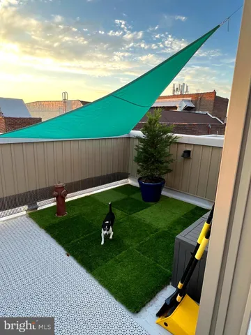a view of swimming pool with a patio