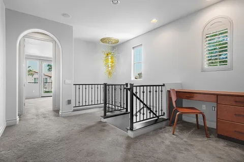 a view of entryway and hall with a window