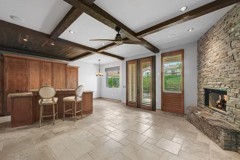 a view of a livingroom with furniture window and outside view