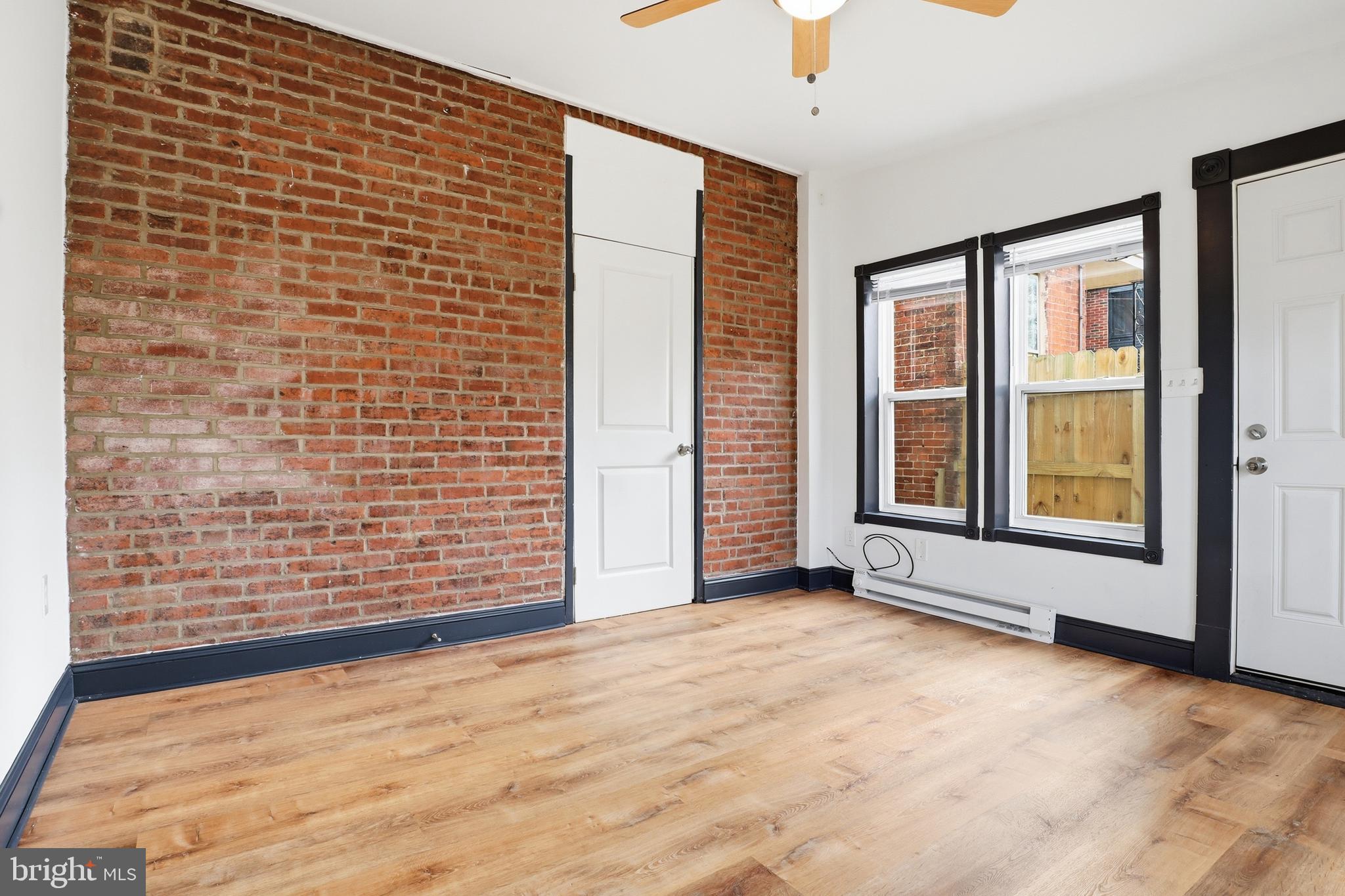 812 South George Street York, PA 17403 - Photo 19 of 58 a view of an empty room with a ceiling fan