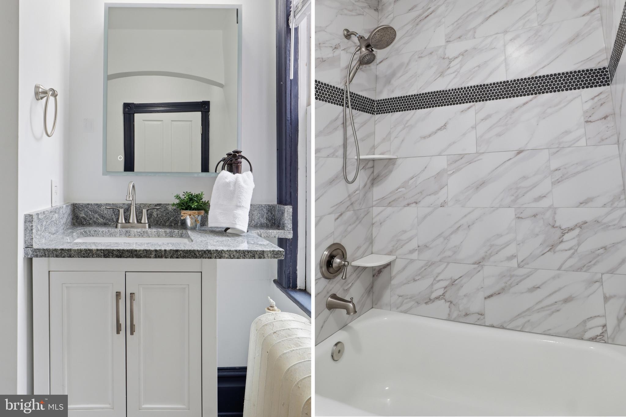 812 South George Street York, PA 17403 - Photo 29 of 58 a bathroom with a granite countertop sink a mirror and shower