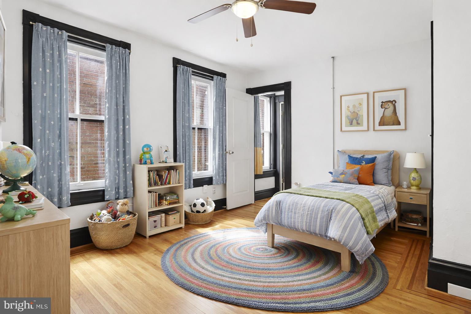 812 South George Street York, PA 17403 - Photo 31 of 58 a bedroom with a bed and a chandelier