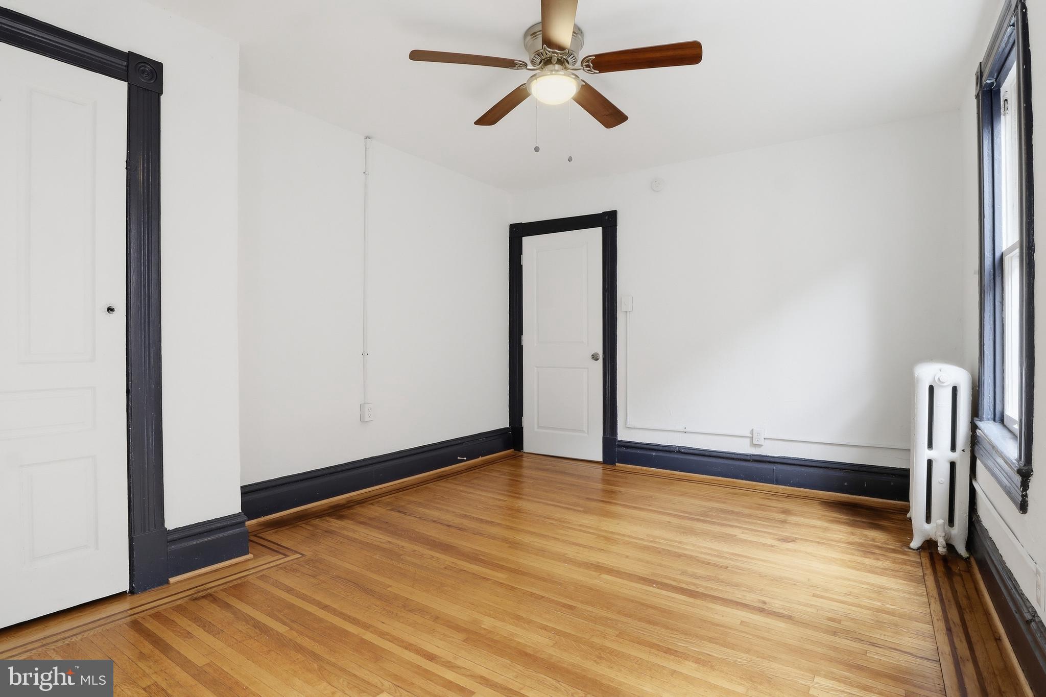 812 South George Street York, PA 17403 - Photo 32 of 58 a view of room with hardwood floor and ceiling fan
