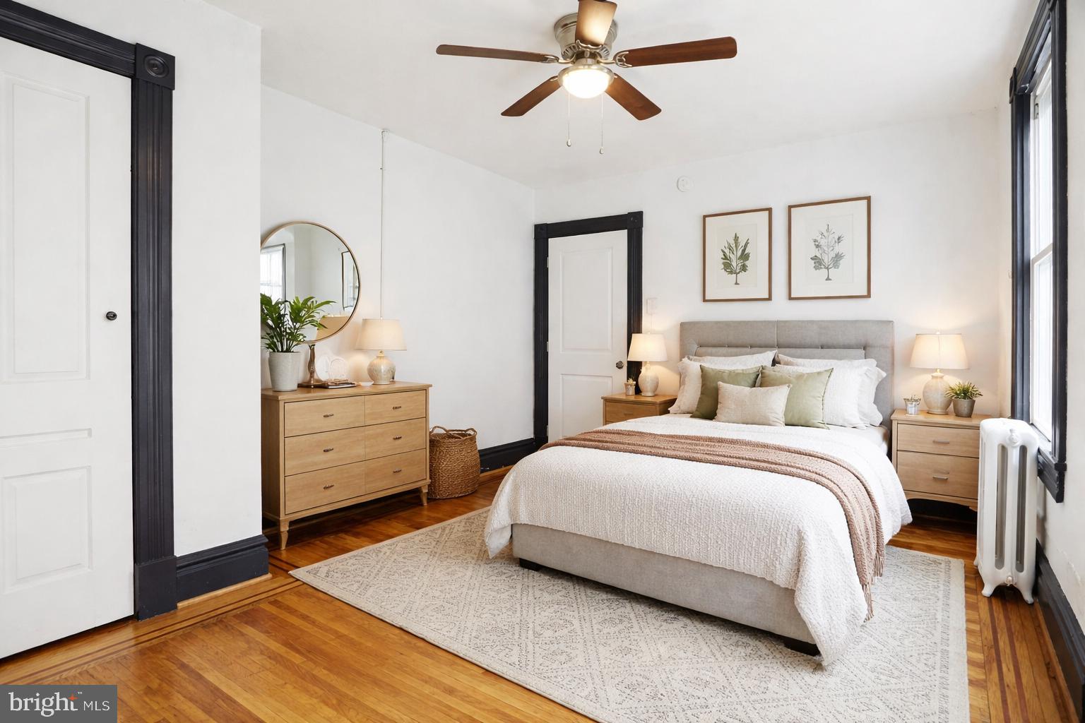 812 South George Street York, PA 17403 - Photo 33 of 58 a bedroom with a bed and a chandelier