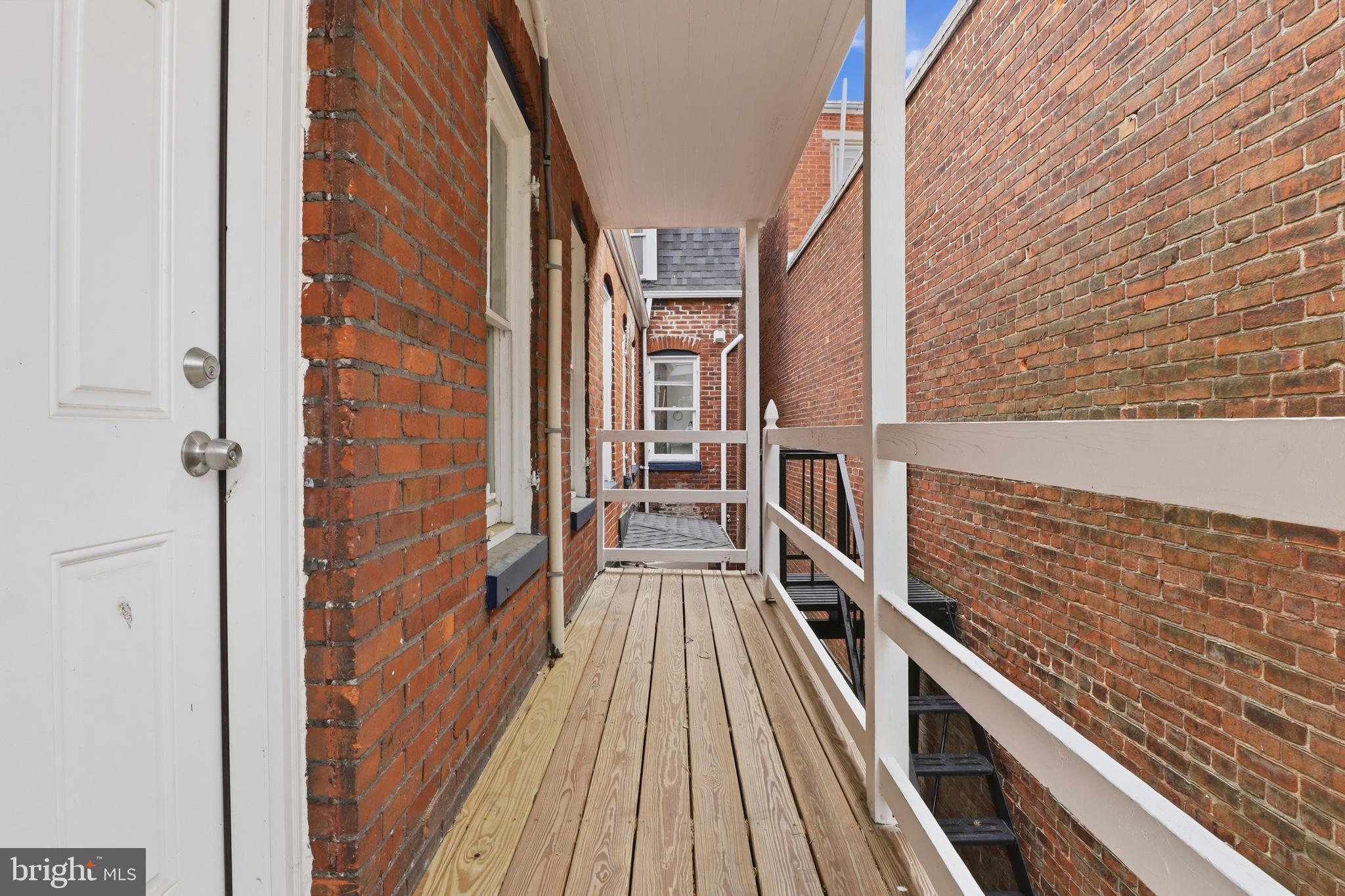 812 South George Street York, PA 17403 - Photo 37 of 58 a view of balcony with wooden floor