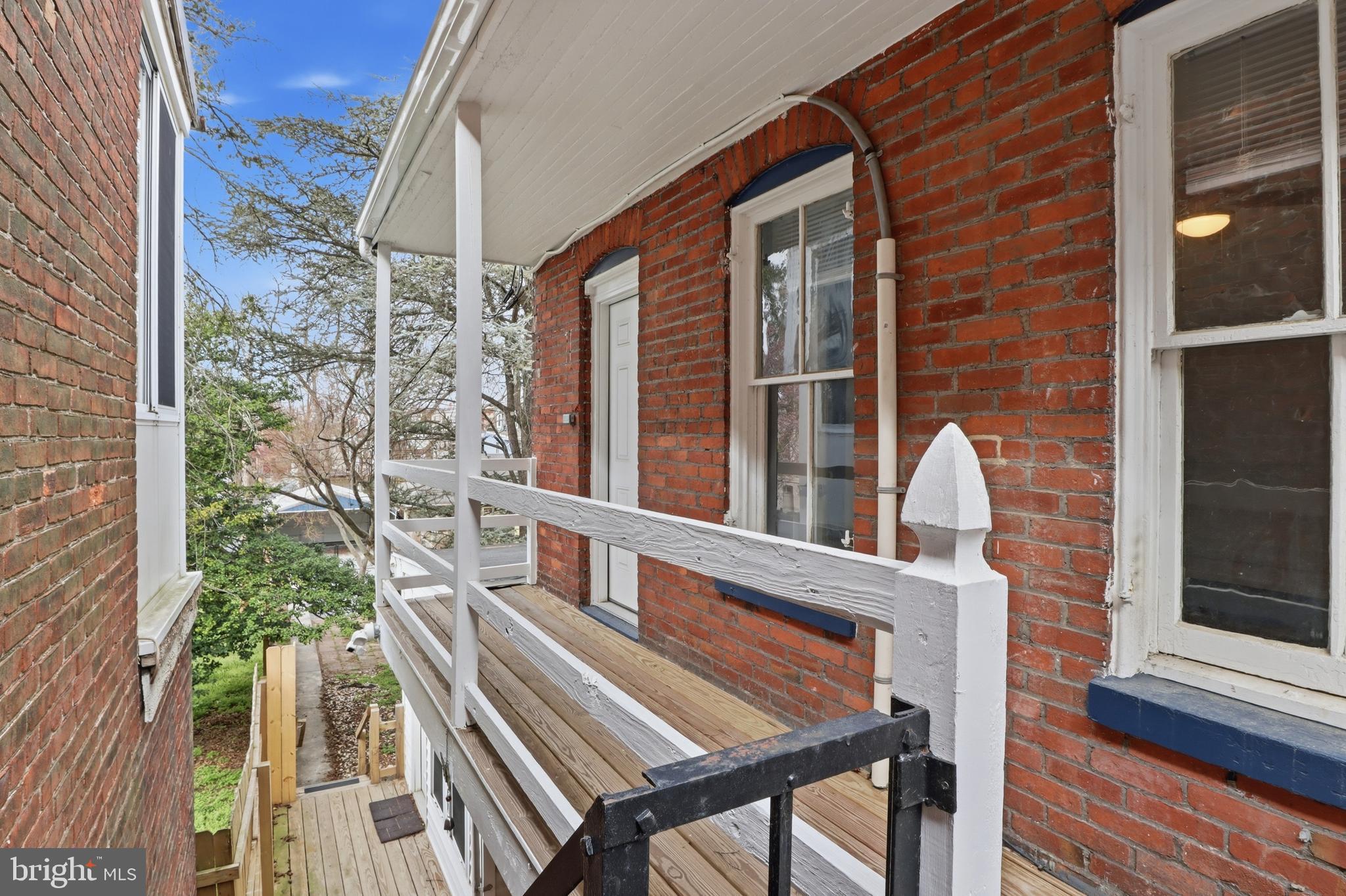 812 South George Street York, PA 17403 - Photo 38 of 58 view of balcony with two chairs and a table