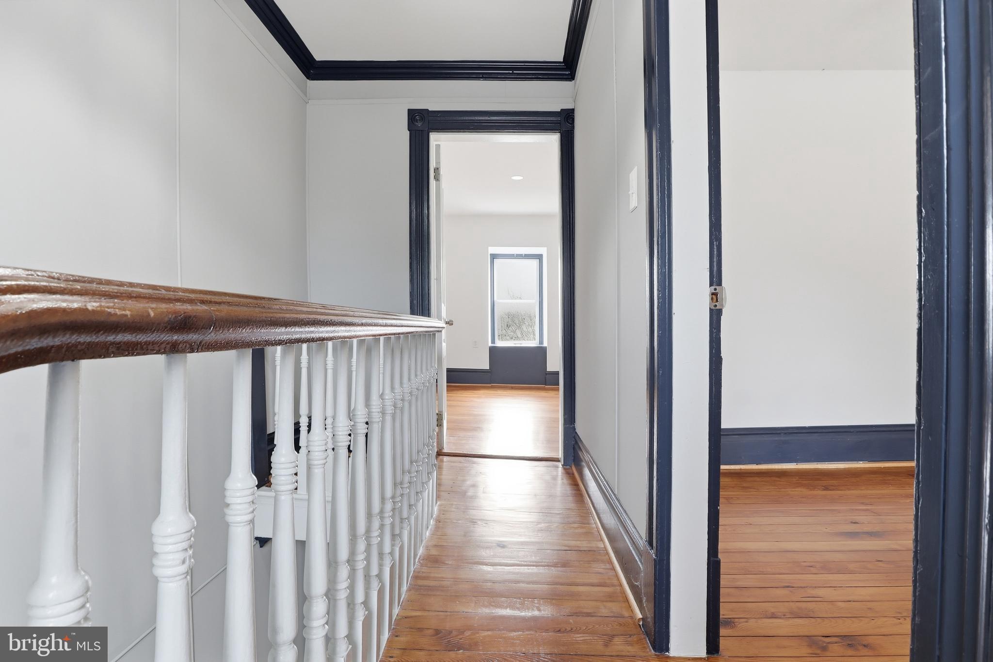 812 South George Street York, PA 17403 - Photo 43 of 58 a view of a hallway with wooden floor and staircase