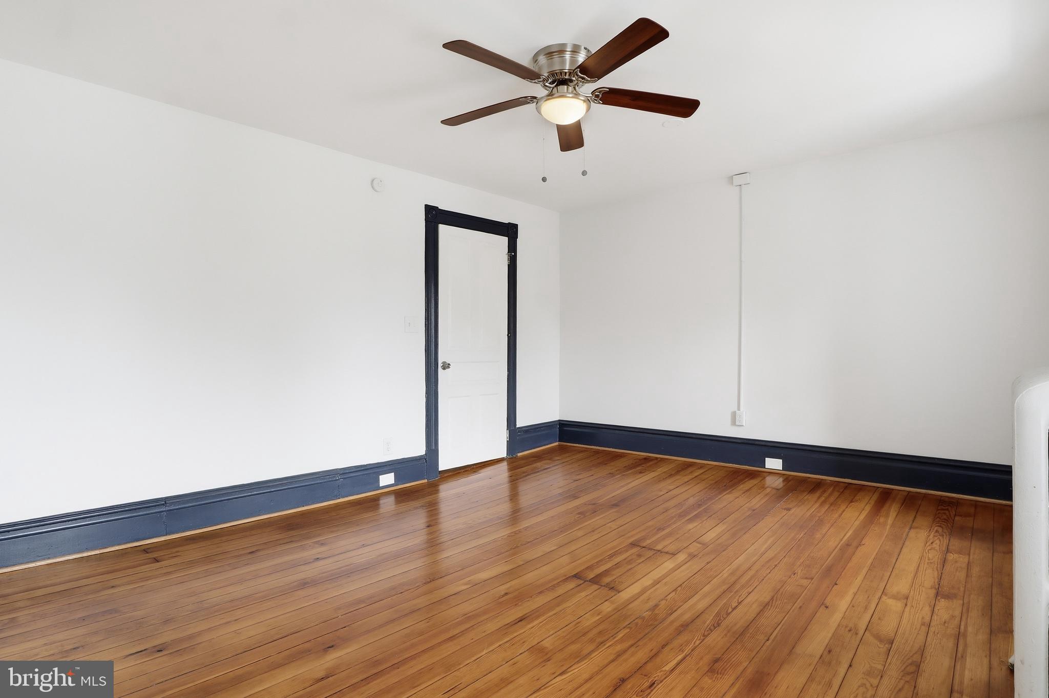 812 South George Street York, PA 17403 - Photo 45 of 58 a view of an empty room with wooden floor