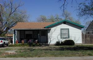 4019 South Jackson Street Amarillo, TX 79110 - Photo 1 of 1 a front view of a house with garden