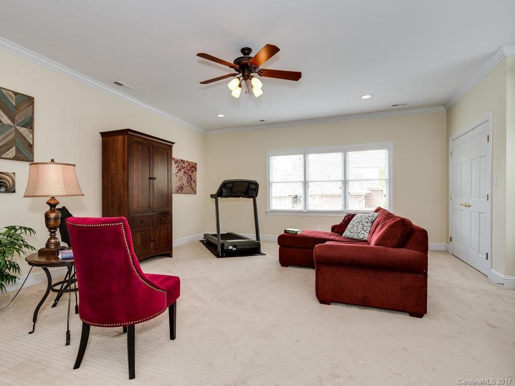 1415 Windy Ridge Road Charlotte, NC 28270 - Photo 20 of 24 a living room with furniture and a window