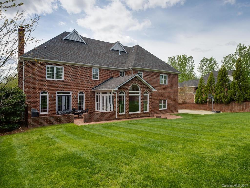 1415 Windy Ridge Road Charlotte, NC 28270 - Photo 24 of 24 a front view of a house with a yard