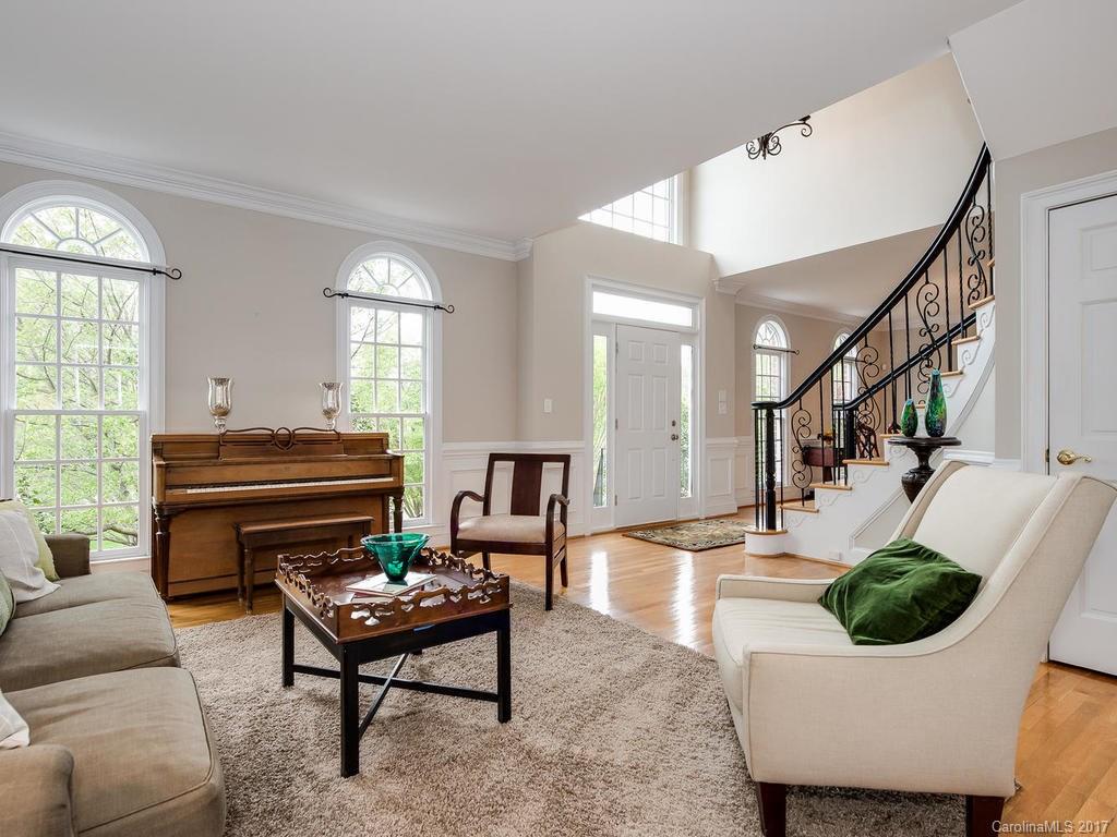 1415 Windy Ridge Road Charlotte, NC 28270 - Photo 6 of 24 a living room with furniture and a piano