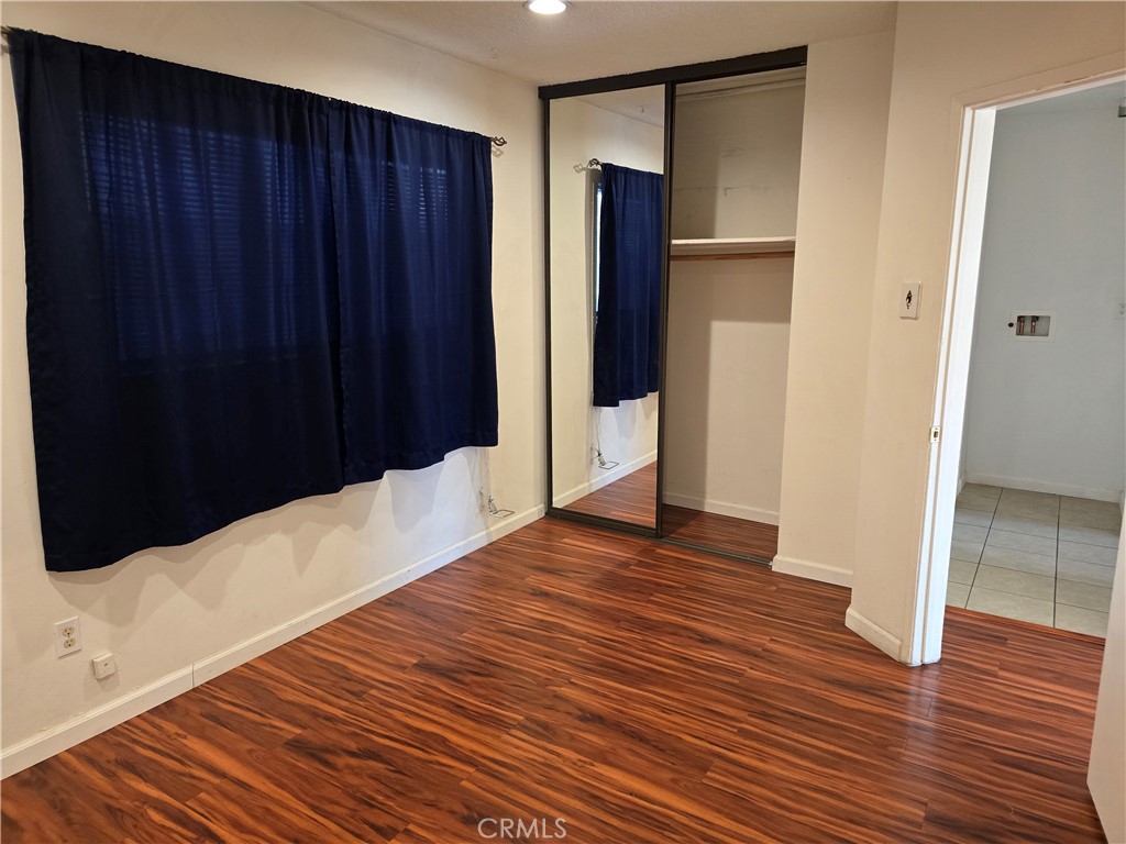 1012 Davis Avenue, Unit B Glendale, CA 91201 - Photo 9 of 11 a big room with wooden floor and closet