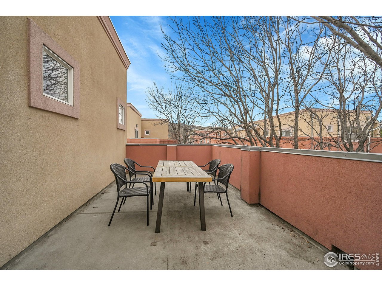 2645 Tabriz Place, Unit 22 Boulder, CO 80304 - Photo 12 of 29 a backyard of a house with table and chairs
