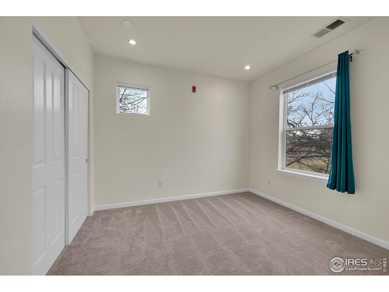 2645 Tabriz Place, Unit 22 Boulder, CO 80304 - Photo 14 of 29 a view of an empty room and window