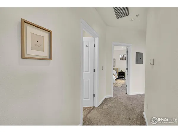 a kitchen with stainless steel appliances granite countertop a refrigerator a stove and a sink with granite countertops