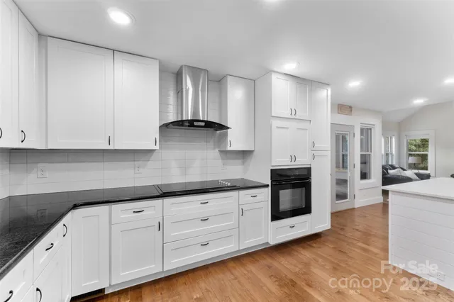 a large kitchen with cabinets
