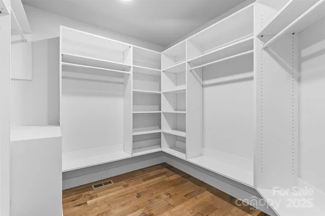 a view of an empty room with empty racks