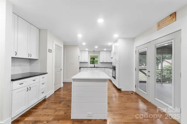 a large kitchen with cabinets