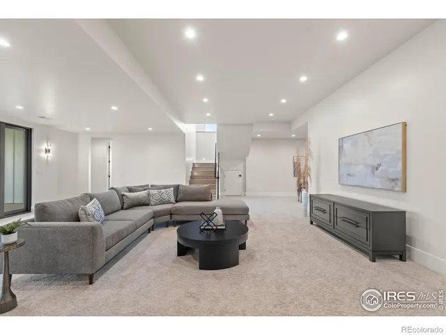 a living room with furniture and a couch