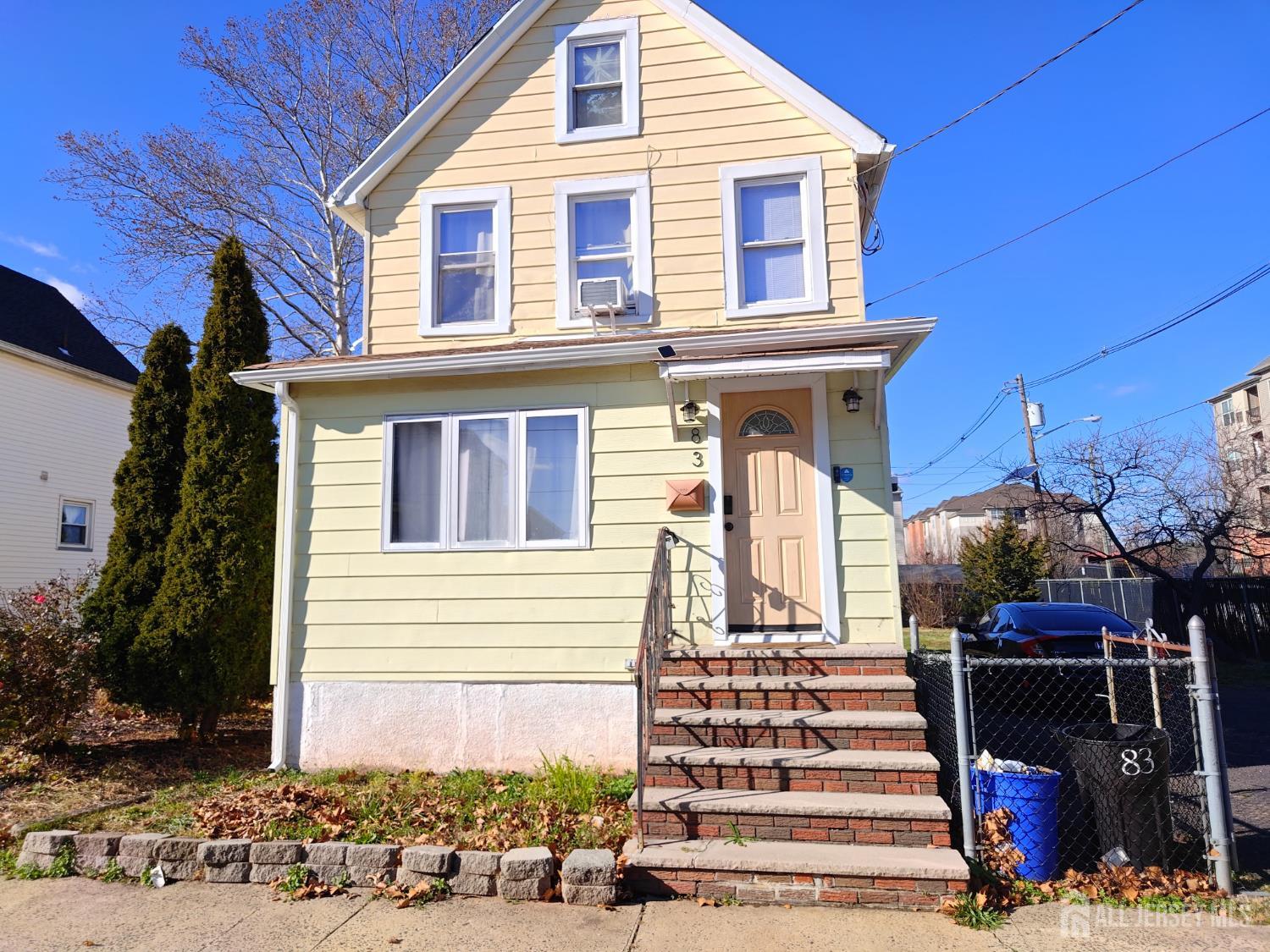 a front view of a house with a porch