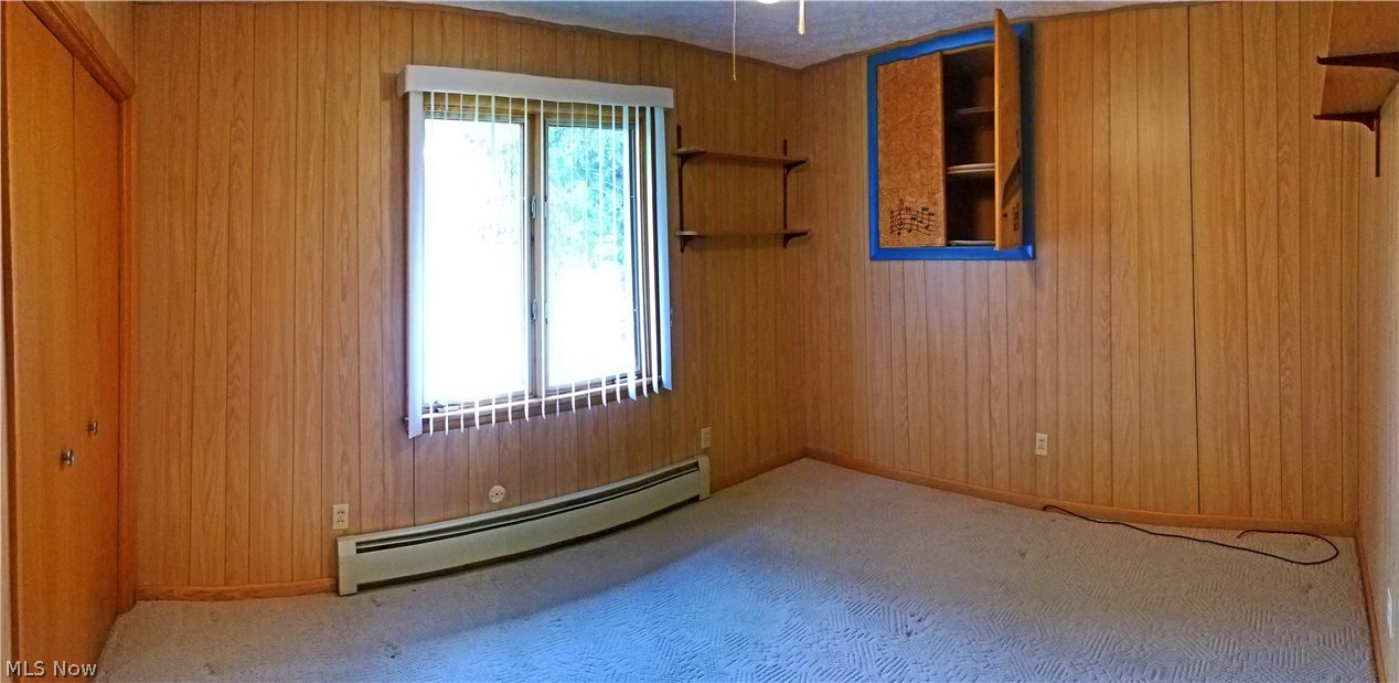 2888 Pressler Road Uniontown, OH 44685 - Photo 17 of 26 Reverse view showing additional wall storage and window with view of front yard.