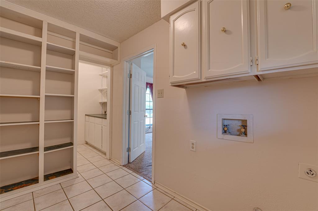 3410 Conlin Drive Rowlett, TX 75088 - Photo 11 of 27 a view of a livingroom with closet