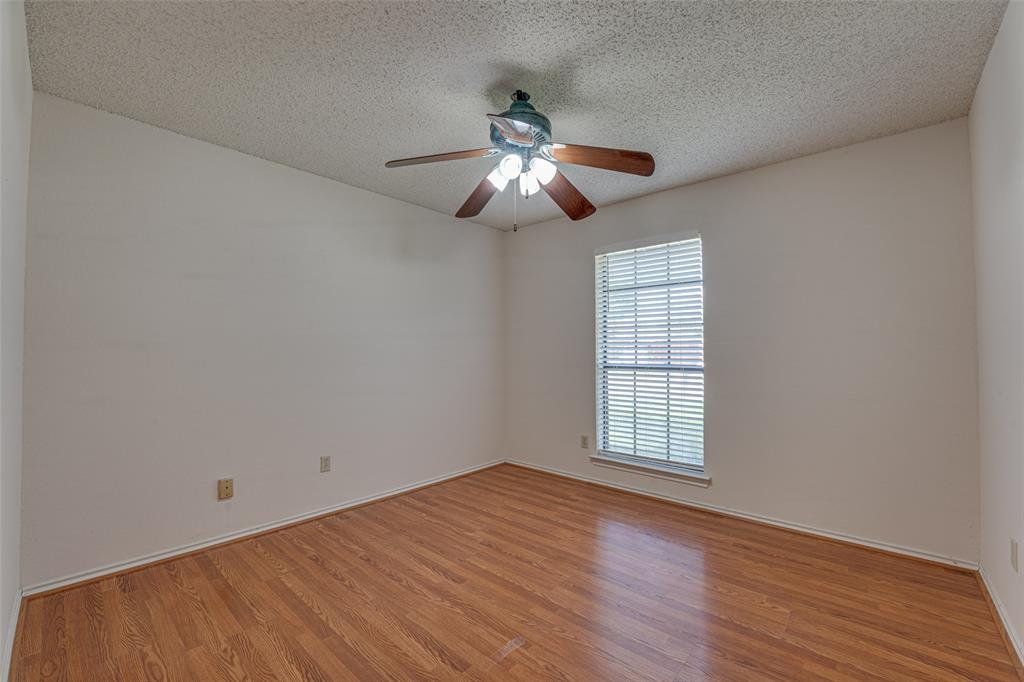 3410 Conlin Drive Rowlett, TX 75088 - Photo 17 of 27 a view of empty room with wooden floor