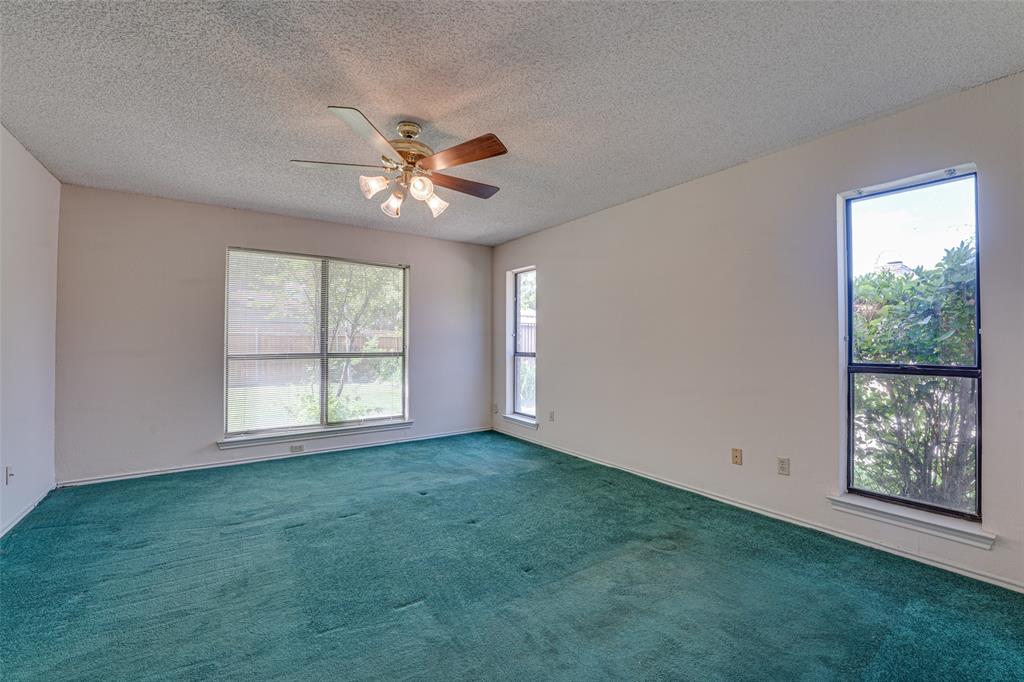 3410 Conlin Drive Rowlett, TX 75088 - Photo 18 of 27 a view of an empty room with a window