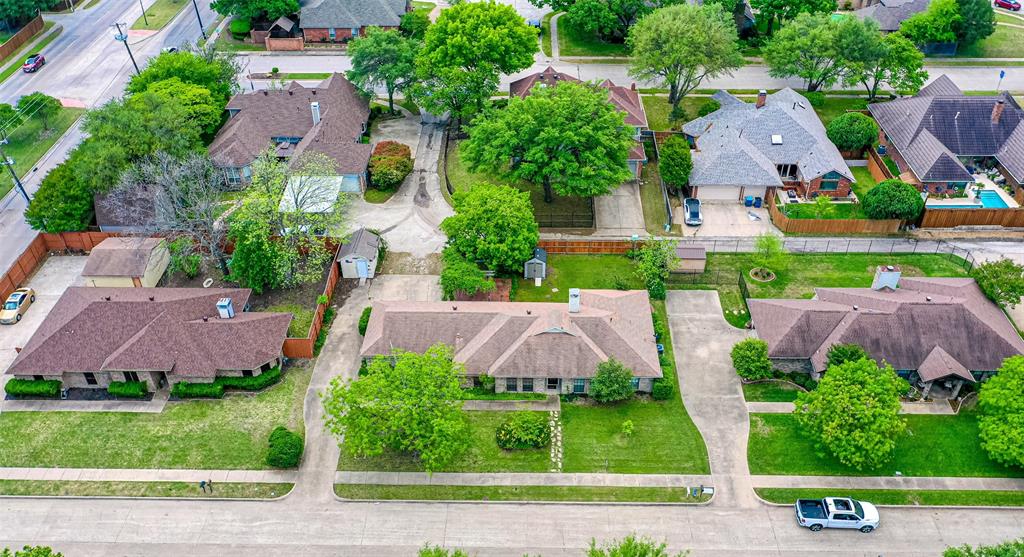 3410 Conlin Drive Rowlett, TX 75088 - Photo 26 of 27 an aerial view of multiple houses with yard