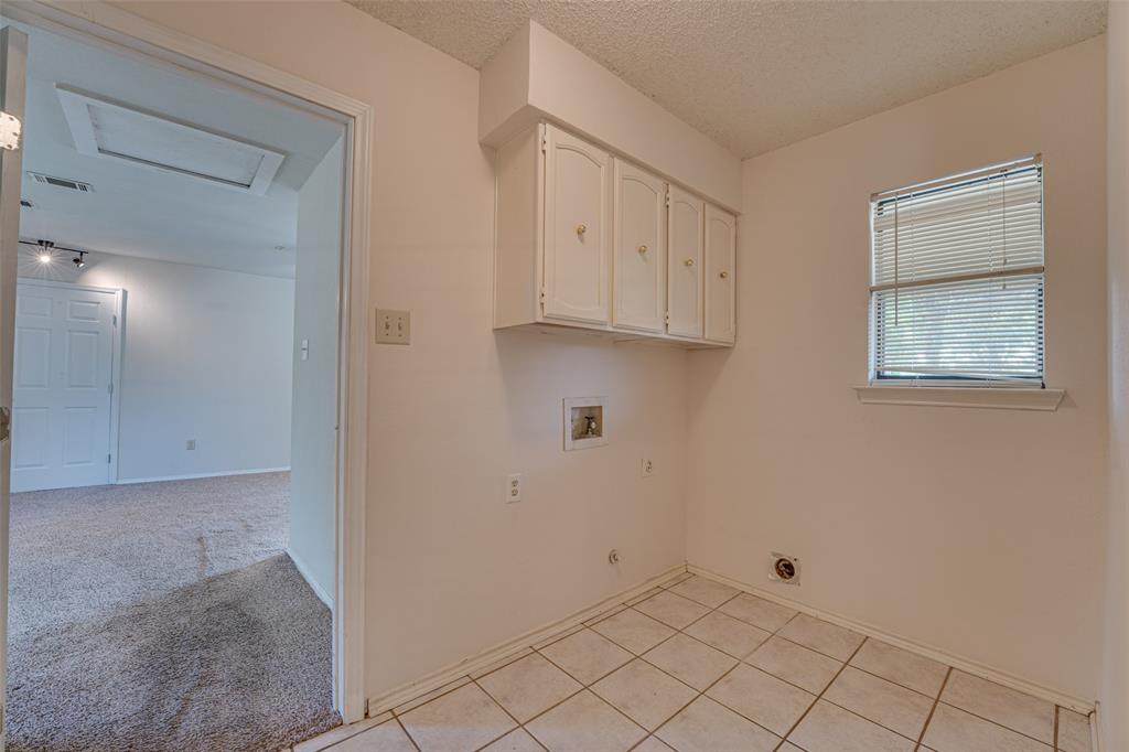 3410 Conlin Drive Rowlett, TX 75088 - Photo 10 of 27 a view of an empty room with window