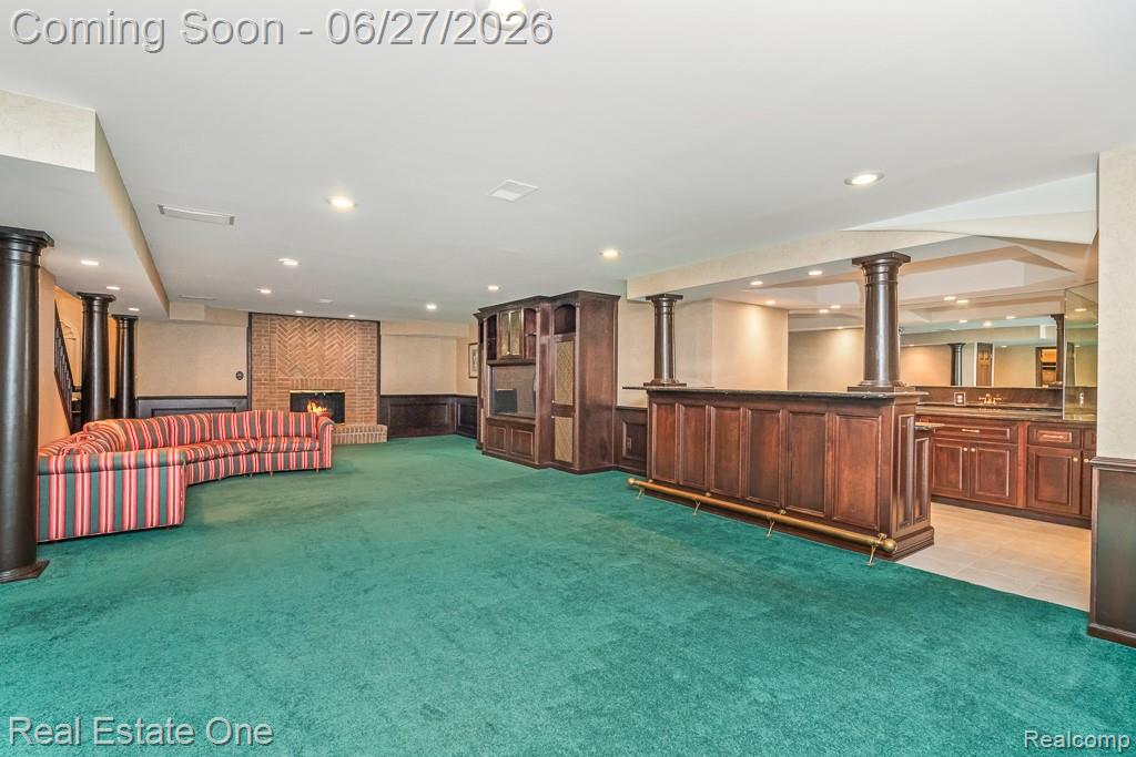 3347 St George Court Rochester, MI 48306 - Photo 35 of 51 Finished basement with wet bar