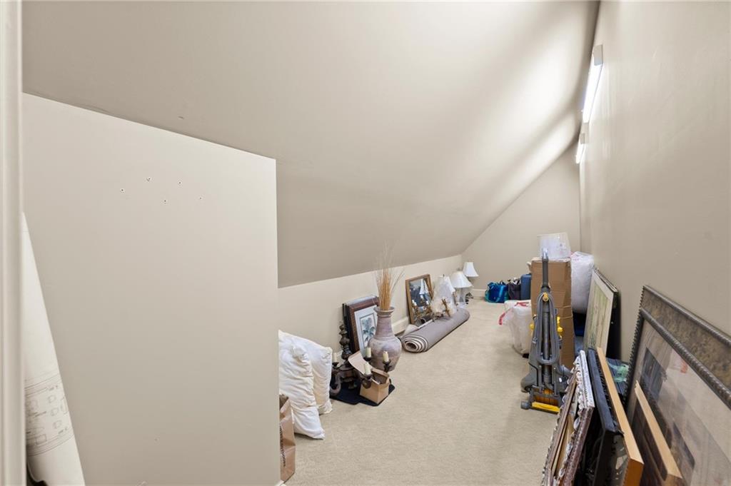 322 Edwards Brook Lane Canton, GA 30115 - Photo 54 of 99 a view of a room with gym equipment