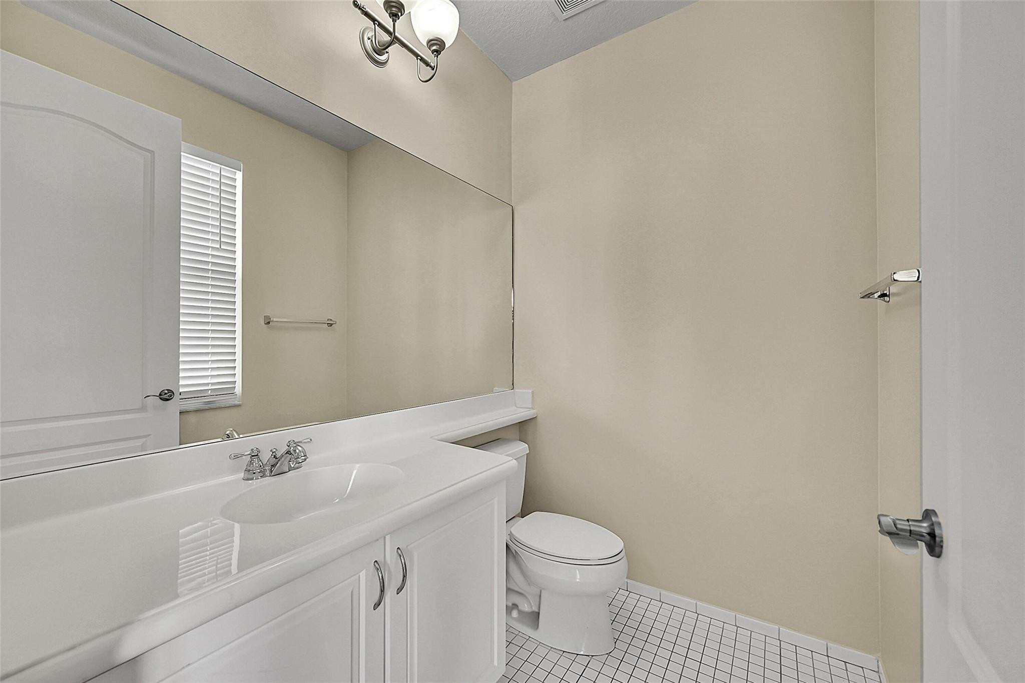 3605 Northwest 5th Terrace Boca Raton, FL 33431 - Photo 12 of 48 a bathroom with a sink a toilet and shower