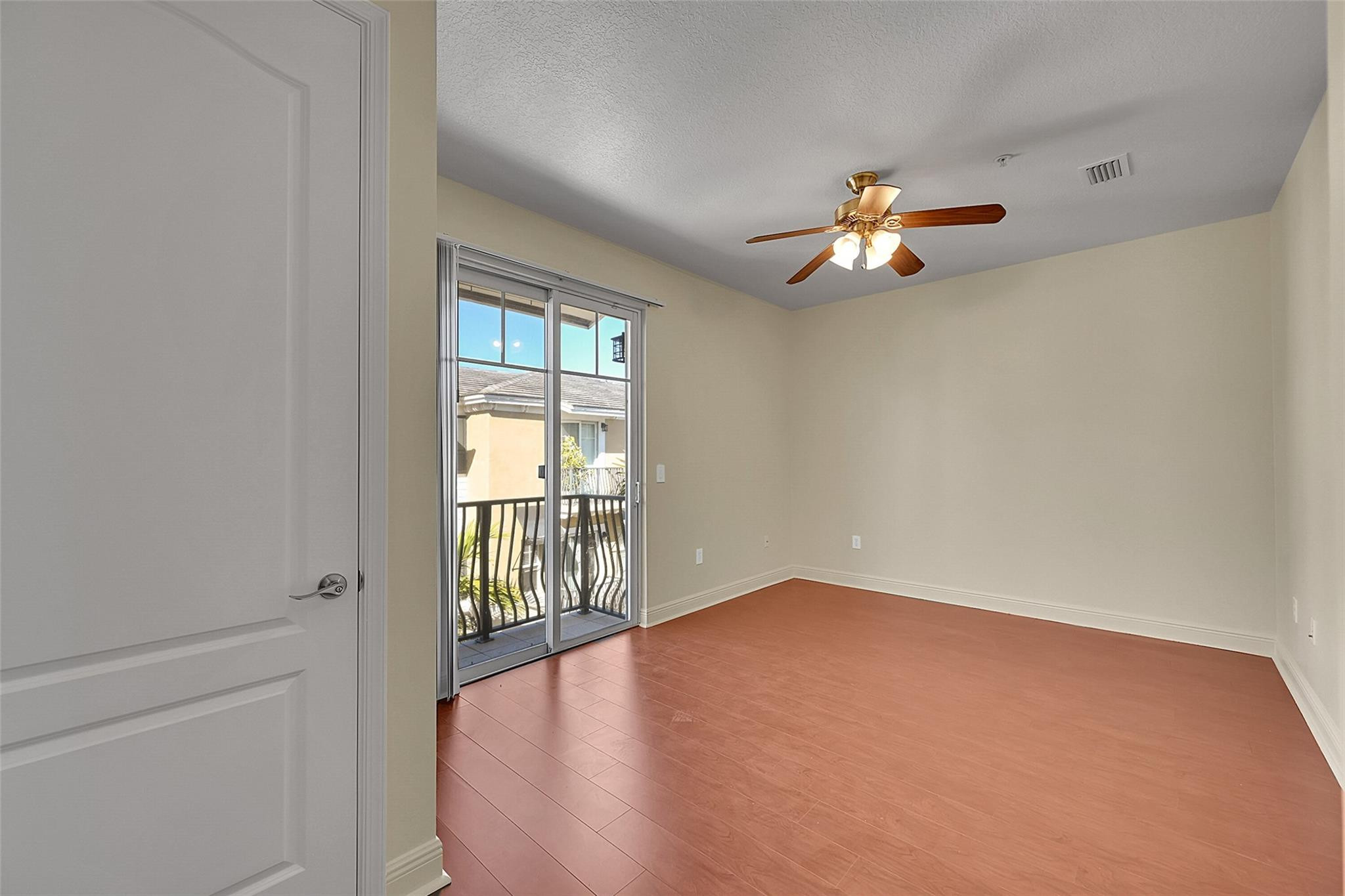 3605 Northwest 5th Terrace Boca Raton, FL 33431 - Photo 32 of 48 wooden floor in an empty room with a window