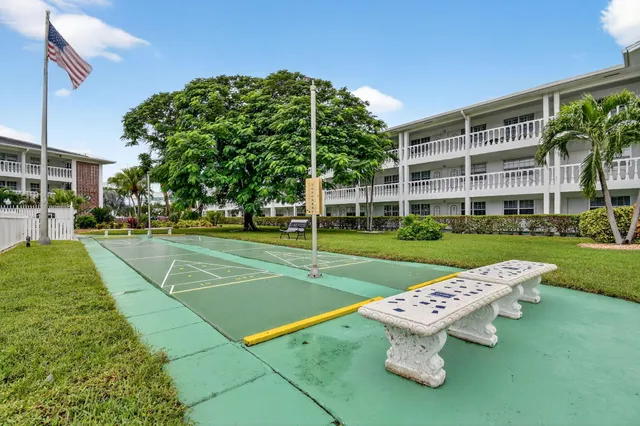 a view of a playground with a patio