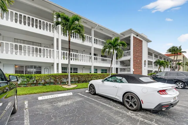 a car parked in front of a house