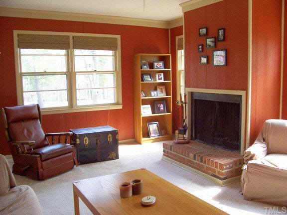 3324 Rolling Hill Road Durham, NC 27705 - Photo 2 of 10 Family room has plenty of space and a masonry fireplace. Other