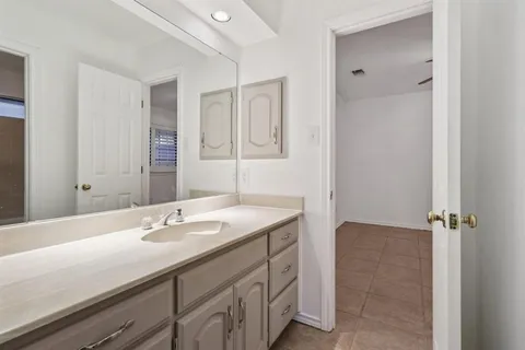 a bathroom with a toilet and a bathtub