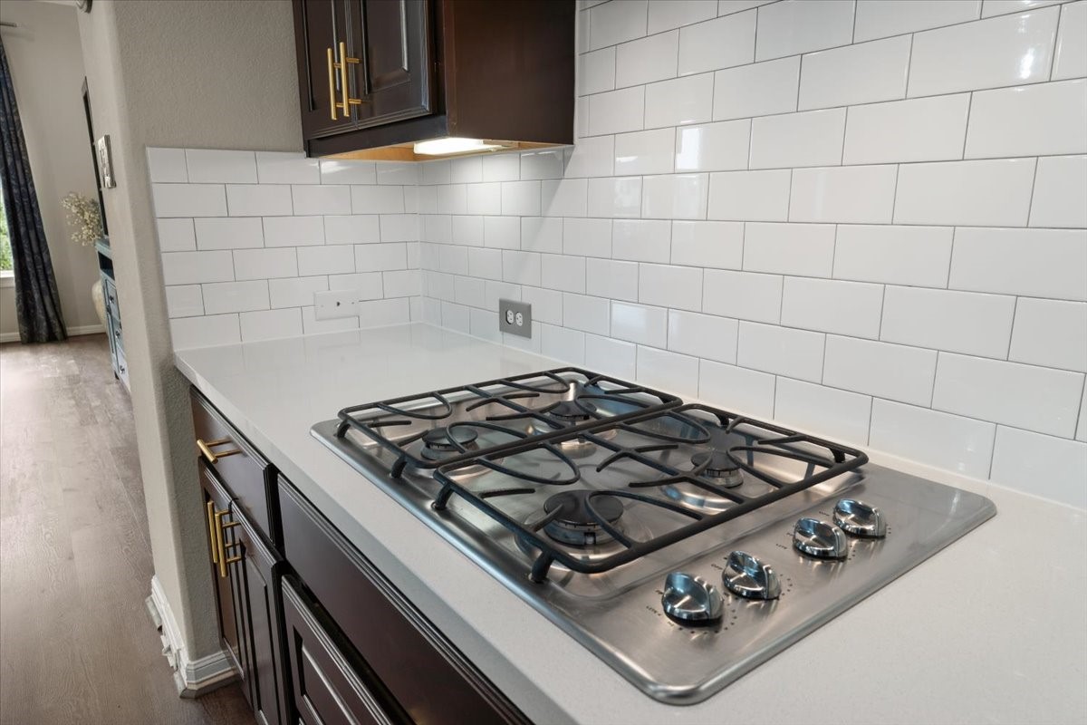 10215 Spring Shadows Park Circle Houston, TX 77080 - Photo 12 of 44 Stainless steel gas cooktop