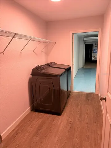 a view of a utility room with washer and dryer