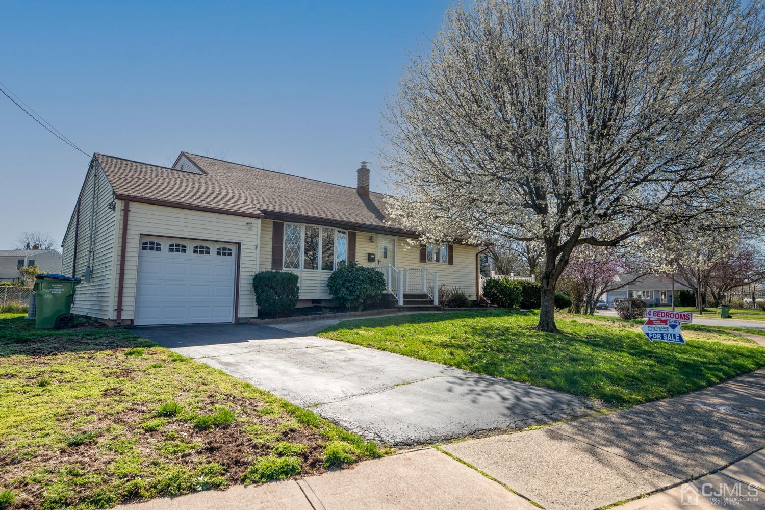 7 Sims Road Edison, NJ 08817 - Photo 2 of 54 a view of a house with a yard
