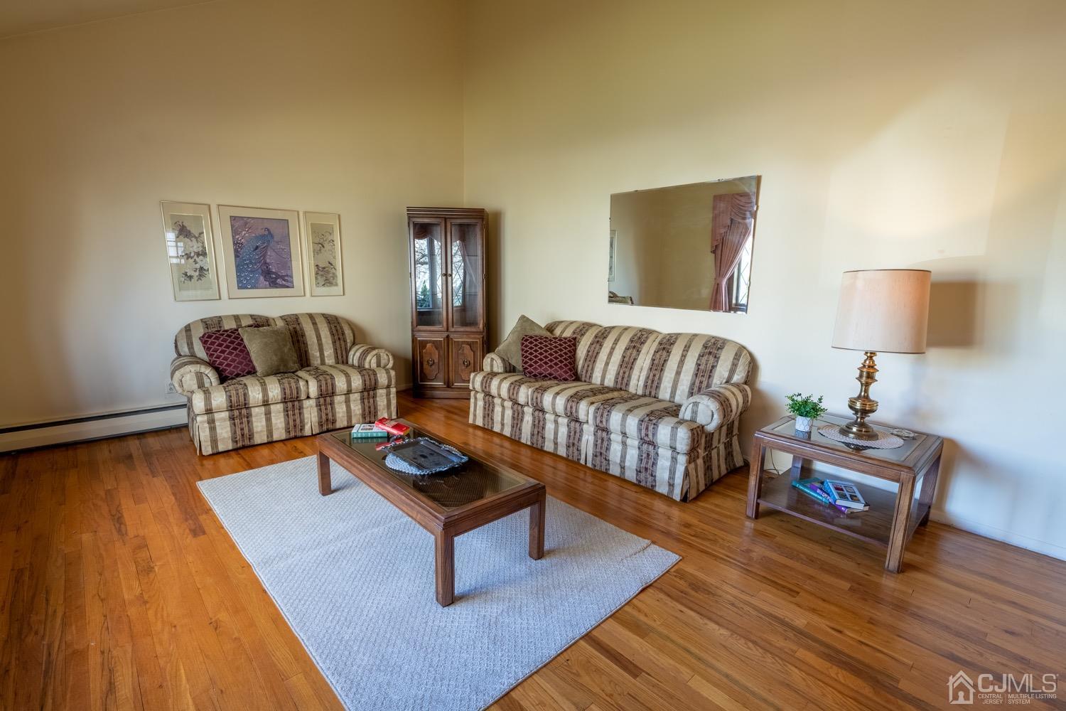 7 Sims Road Edison, NJ 08817 - Photo 8 of 54 a living room with furniture and a wooden floor