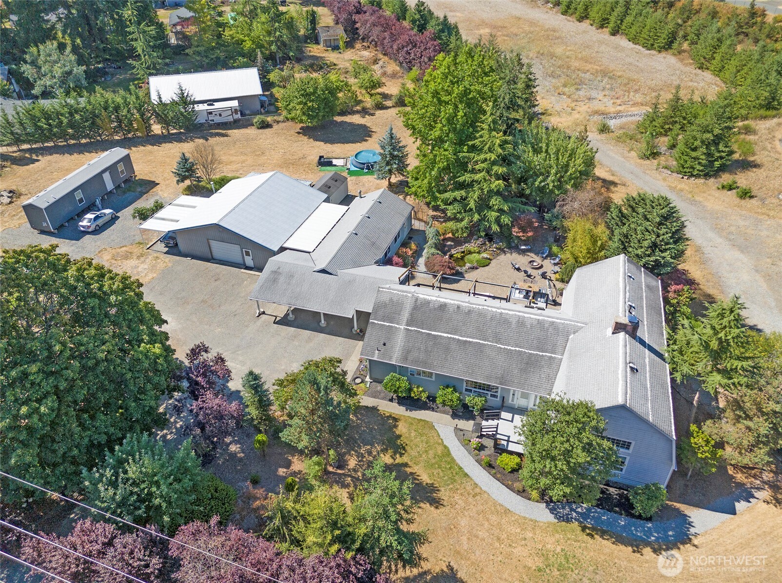 4712 Brookdale Road East Tacoma, WA 98446 - Photo 1 of 40 an aerial view of a house with outdoor space