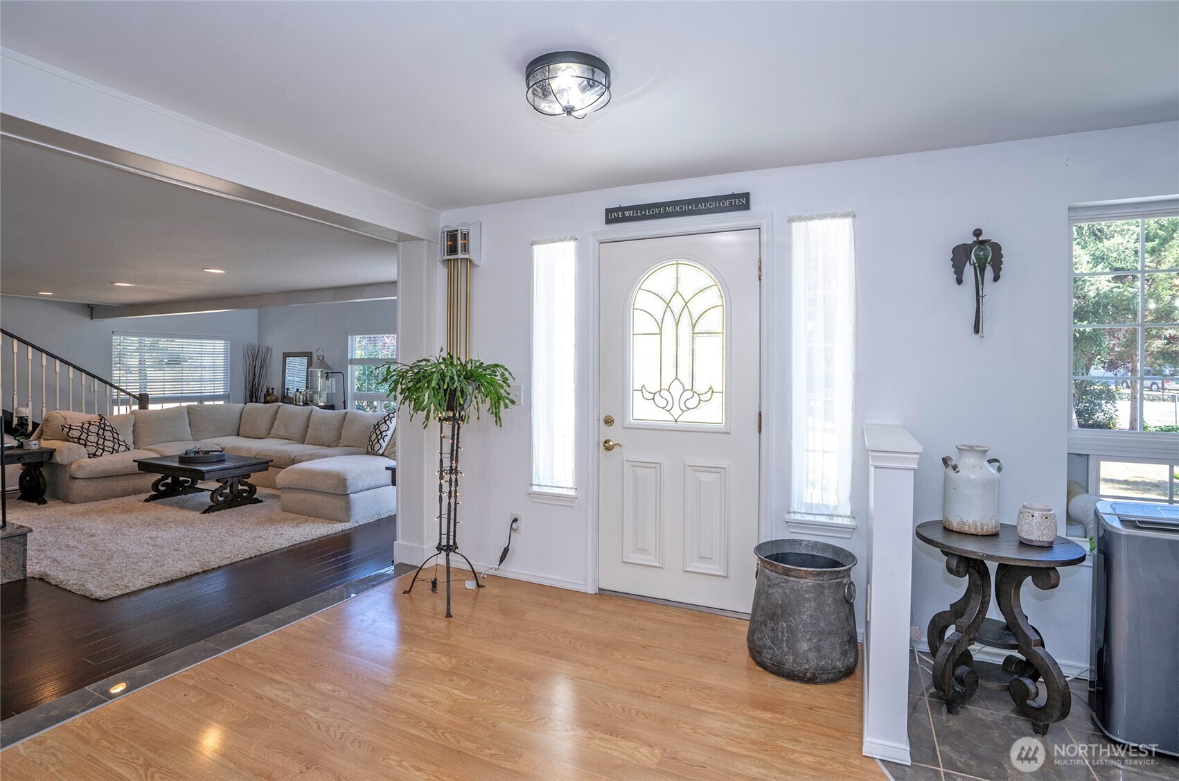 4712 Brookdale Road East Tacoma, WA 98446 - Photo 12 of 40 a living room with furniture and a potted plant