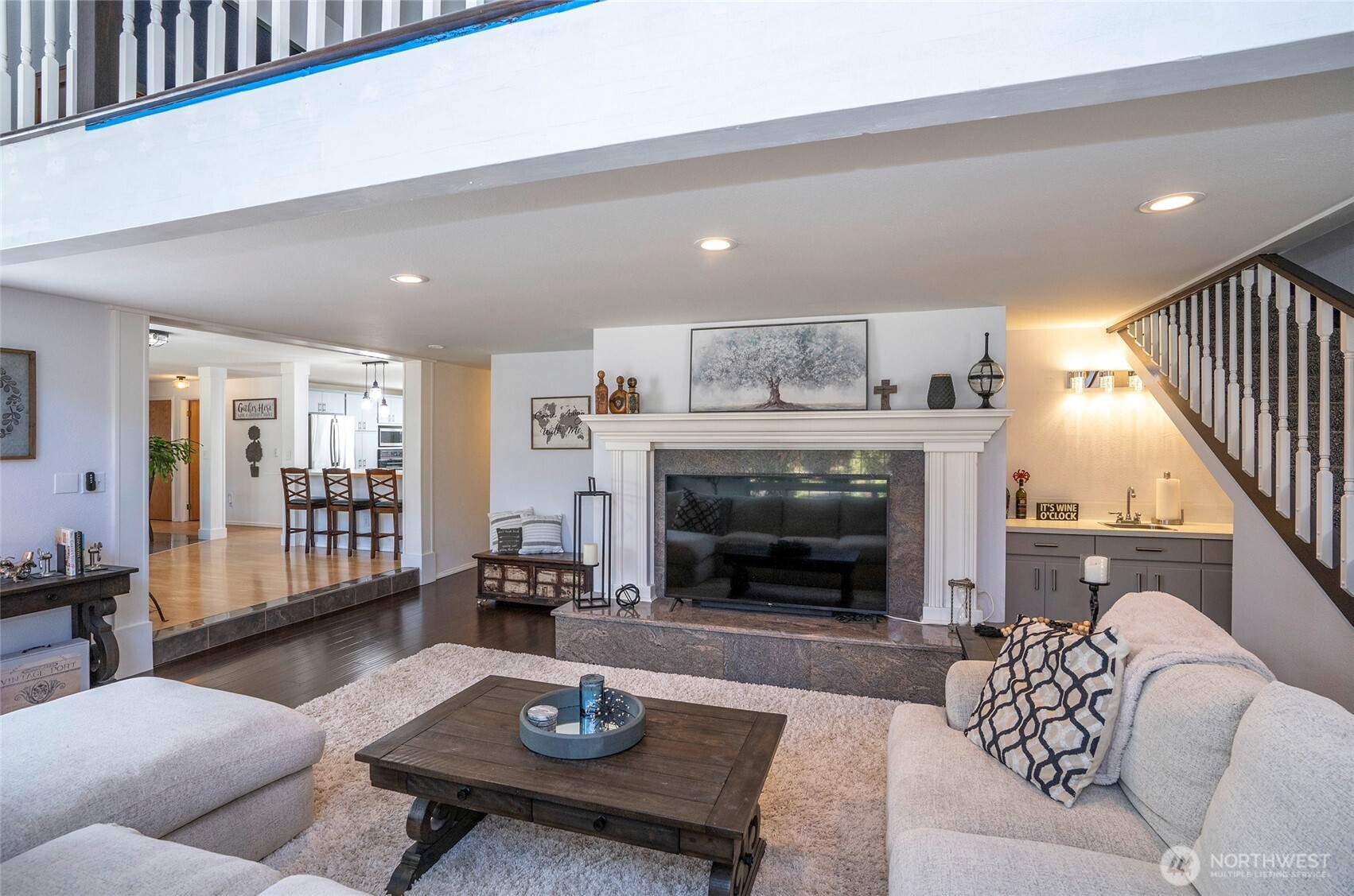 4712 Brookdale Road East Tacoma, WA 98446 - Photo 13 of 40 a living room with furniture and a fireplace