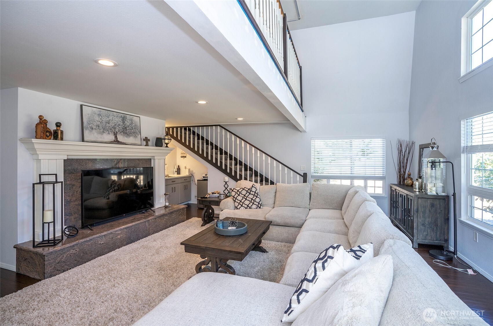 4712 Brookdale Road East Tacoma, WA 98446 - Photo 14 of 40 a living room with furniture and a fireplace