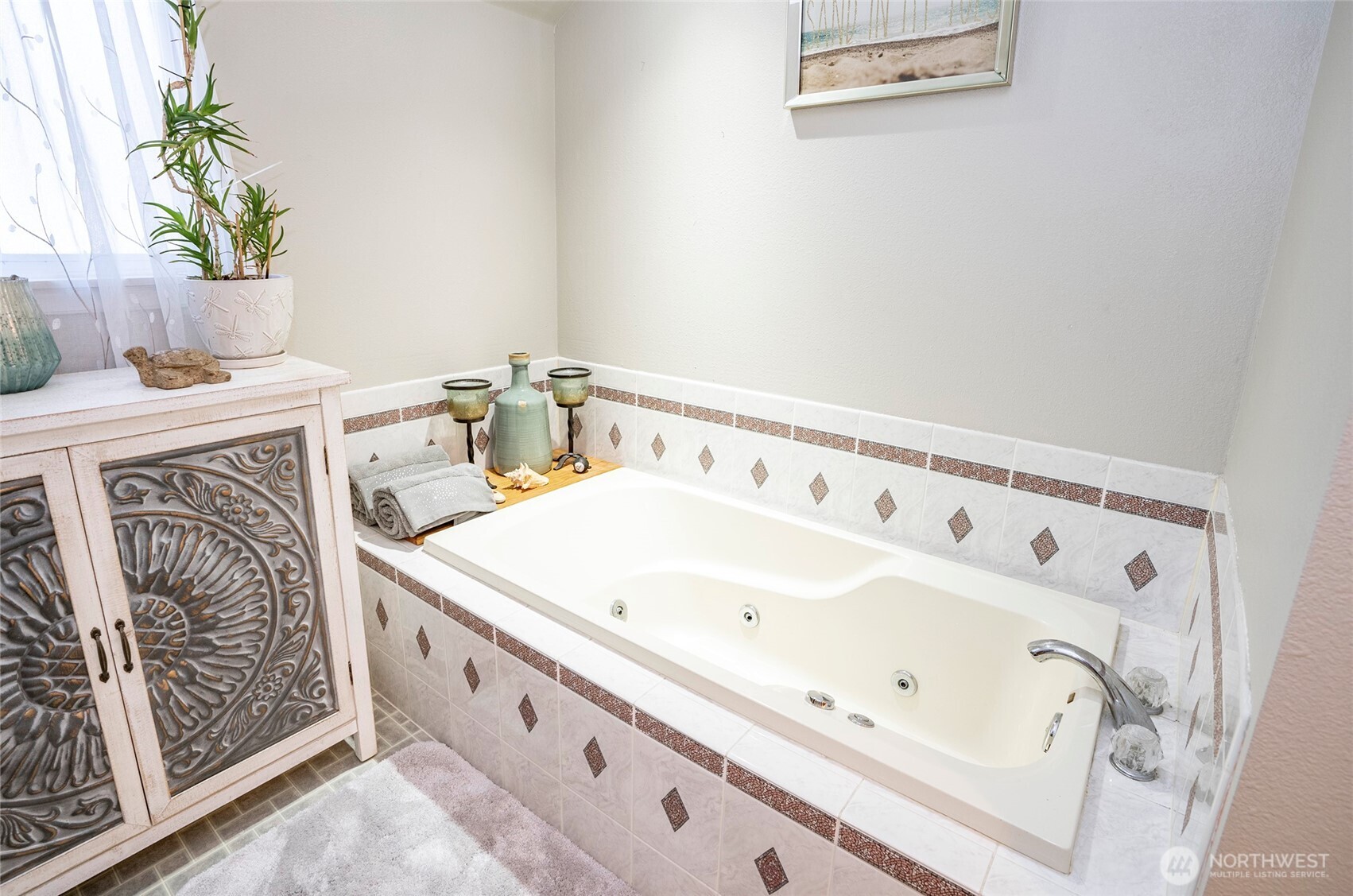 4712 Brookdale Road East Tacoma, WA 98446 - Photo 25 of 40 a bathroom with a sink and a mirror